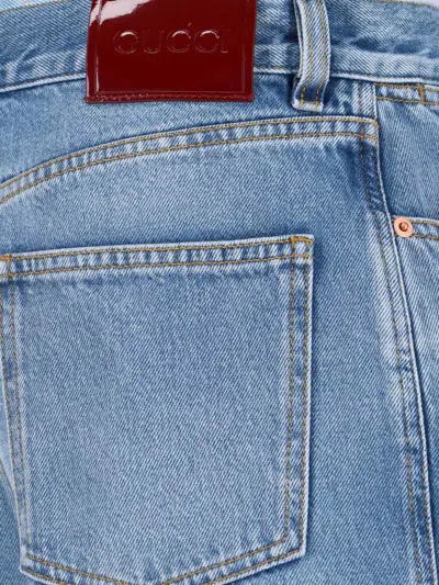 Gucci Blue Jeans With Logo Patch On The Rear And Faded Effect In Denim Woman