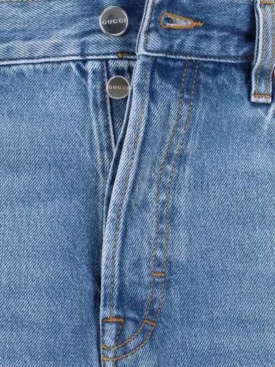 Gucci Blue Jeans With Logo Patch On The Rear And Faded Effect In Denim Woman