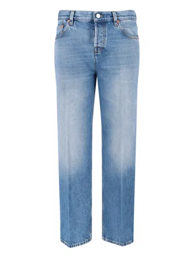 Gucci Blue Jeans With Logo Patch On The Rear And Faded Effect In Denim Woman