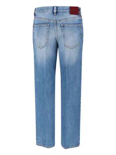 Gucci Blue Jeans With Logo Patch On The Rear And Faded Effect In Denim Woman