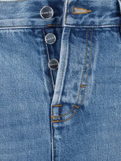 Gucci Blue Jeans With Logo Patch On The Rear And Faded Effect In Denim Woman