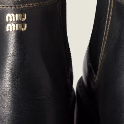 Miu Miu Ankle Boots With Chunky Sole And Pull Tab In Animal Print