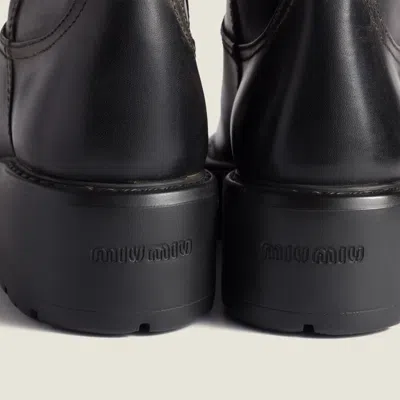 Miu Miu Leather Boots In Animal Print