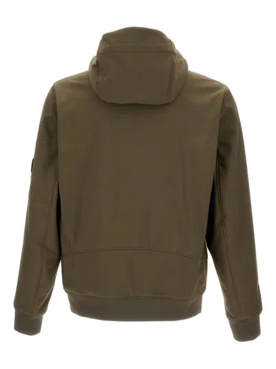 C.p. Company Matte-finish Hooded Jacket With Zippered Pockets And Logo Patch In Green