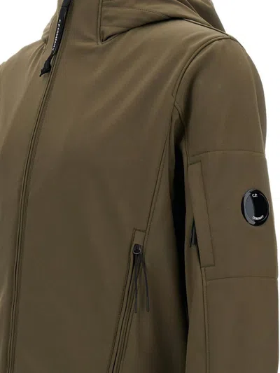 C.p. Company Matte-finish Hooded Jacket With Zippered Pockets And Logo Patch In Green