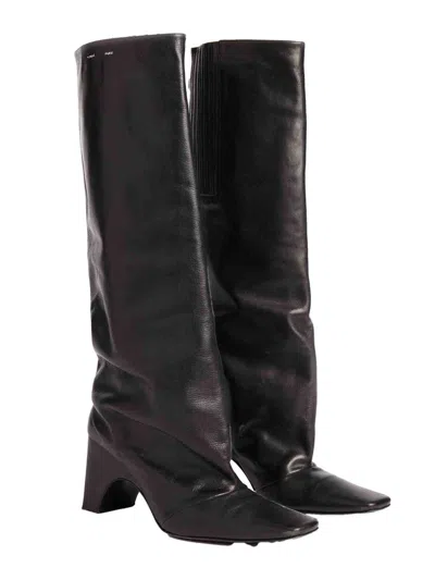 Coperni Bridge Boots In Black