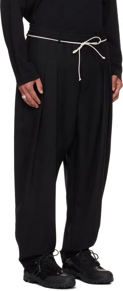 Mordecai Tapered Black Trousers With Pleated Front In Black