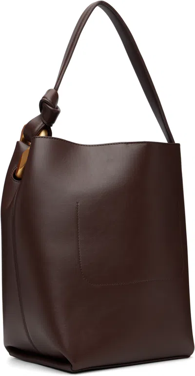 Jw Anderson J. W. Anderson Sleek Bucket Bag With Magnetic Closure In Brown