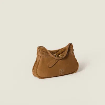Miu Miu Aventure Shearling Bag In Brown