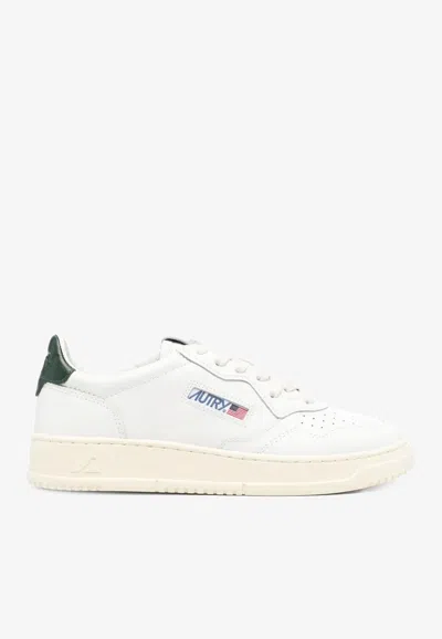 Autry Minimalist Low-top Sneakers With Perforated Detailing In White