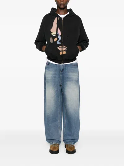 Kidsuper Side Eye Face Hoodie In Black