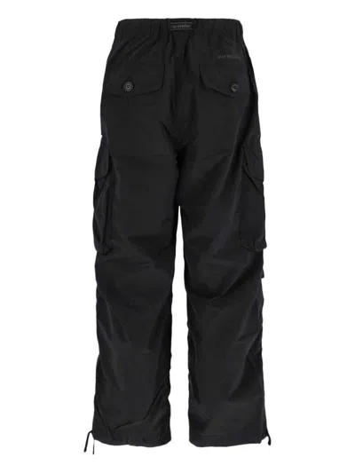 And Wander 95 High Count Cloth Side Zip Hemm Pants In Black