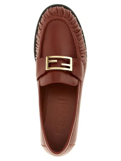 Fendi Curled Metal Detail Baguette Loafers In Brown