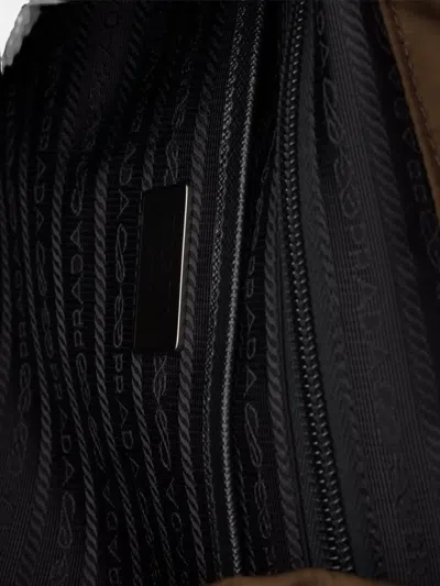 Prada Front-pockets Backpack In Brown