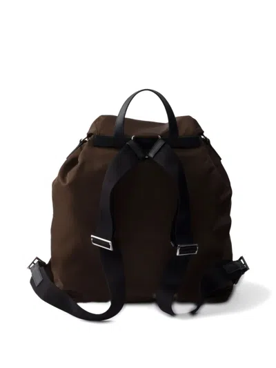 Prada Front-pockets Backpack In Brown