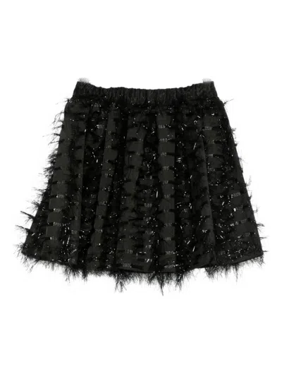 流苏边饰半身裙