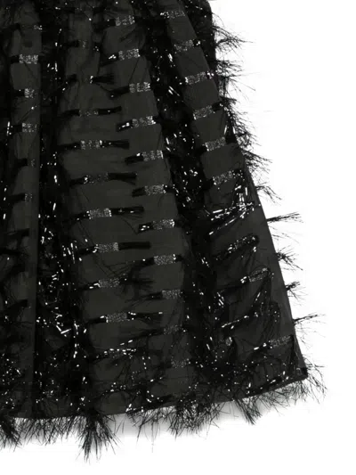 流苏边饰半身裙