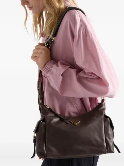 Prada Large Explore Leather Shoulder Bag In Brown
