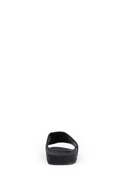 Balenciaga Slide Sandals With Flat Sole And Open Toe In Black