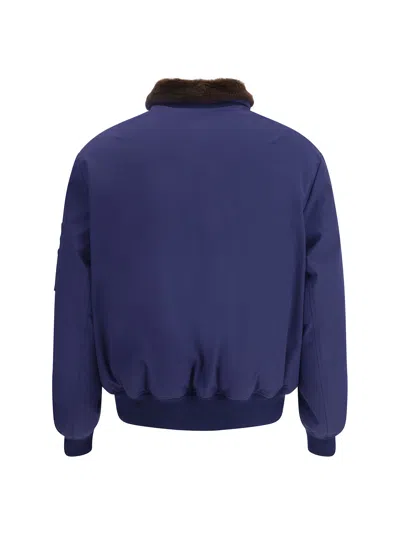 Brunello Cucinelli Nylon Down Jacket With A Shearling Collar In Blue