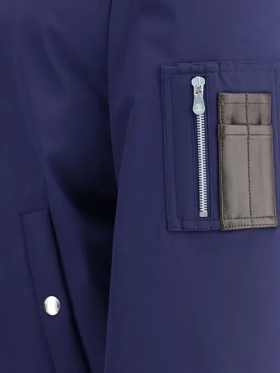 Brunello Cucinelli Nylon Down Jacket With A Shearling Collar In Blue