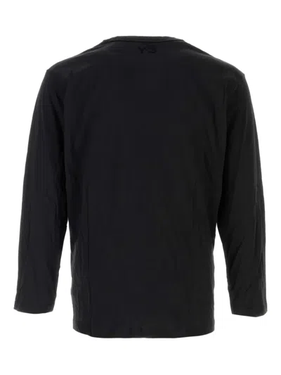 Kuro Long-sleeves Logo-detail T-shirt In Black