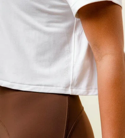 While On Earth™ Range Tee In White