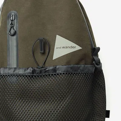 And Wander Triangular-logo Backpack