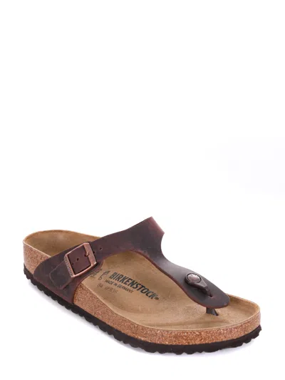 Birkenstock Oiled Leather Flip-flops In Brown
