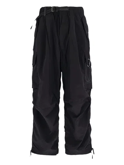 And Wander 95 High Count Cloth Side Zip Hemm Pants In Black