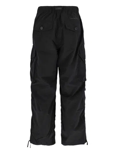 And Wander 95 High Count Cloth Side Zip Hemm Pants In Black