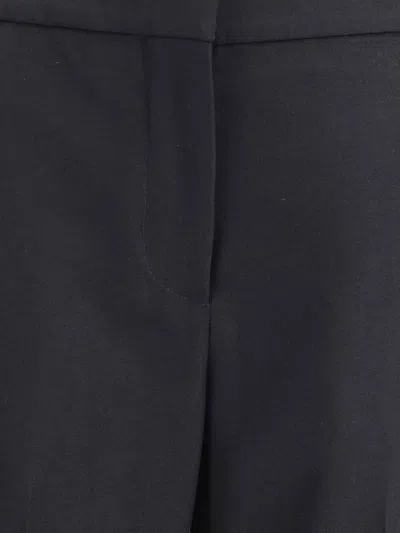 Givenchy Wool Grain De Poudre Bootcut Trousers In Black