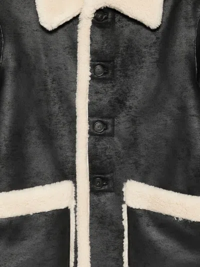 Dunst Reversible Unisex Shearling Jacket In Black