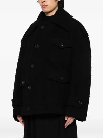 Songzio Single-breasted Coat In Black