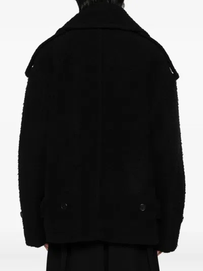 Songzio Single-breasted Coat In Black