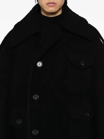 Songzio Single-breasted Coat In Black