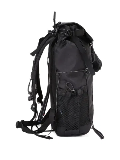 And Wander Adjustable-straps Backpack In Black