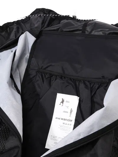 And Wander Adjustable-straps Backpack In Black