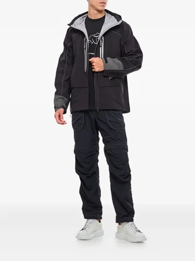 And Wander Shield-effect Hooded Jacket In Black