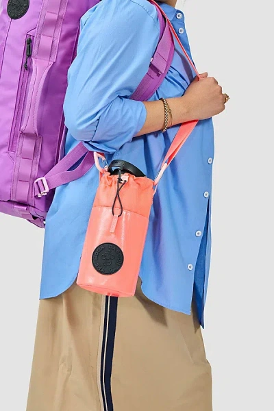 Baboon To The Moon Water Bottle Sling In Neon Punch At Urban Outfitters In Pink