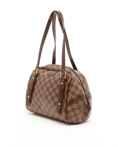 Pre-owned Louis Vuitton Damier Ebene Rivington Pm Bag In Brown