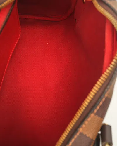 Pre-owned Louis Vuitton Damier Ebene Rivington Pm Bag In Brown