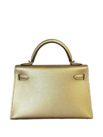 Pre-owned Hermes 2025 Mini Kelly Sellier 20 Handbag In Gold