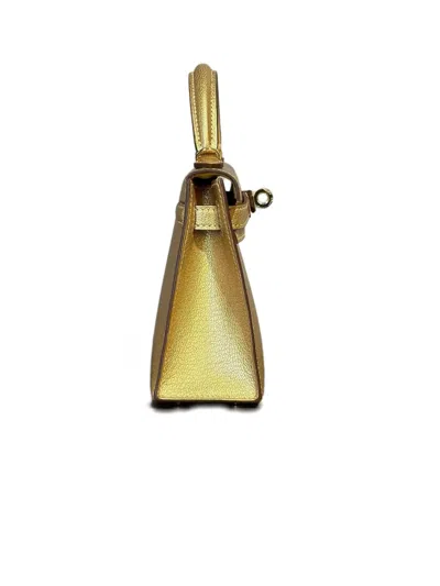 Pre-owned Hermes 2025 Mini Kelly Sellier 20 Handbag In Gold