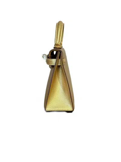 Pre-owned Hermes 2025 Mini Kelly Sellier 20 Handbag In Gold