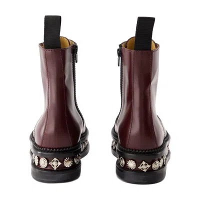 Toga Stud-embellished Leather Boots In Burgundy