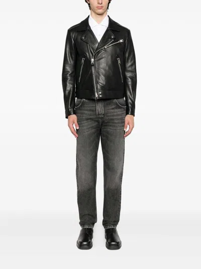 Balmain Jeans With Logo Appliqué In Black