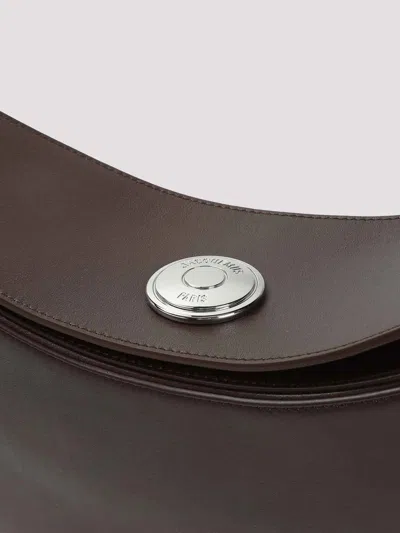 Jacquemus Le Calisso Rond Large Brown Shoulder Bag With Adjustable Strap And Embossed Logo In Leathe In Brown