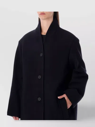 Studio Nicholson Long Coat With Structured Shoulders And Pockets In Black