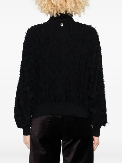 Twinset Textured Black Turtleneck Sweater With Ballooned Sleeves In Black